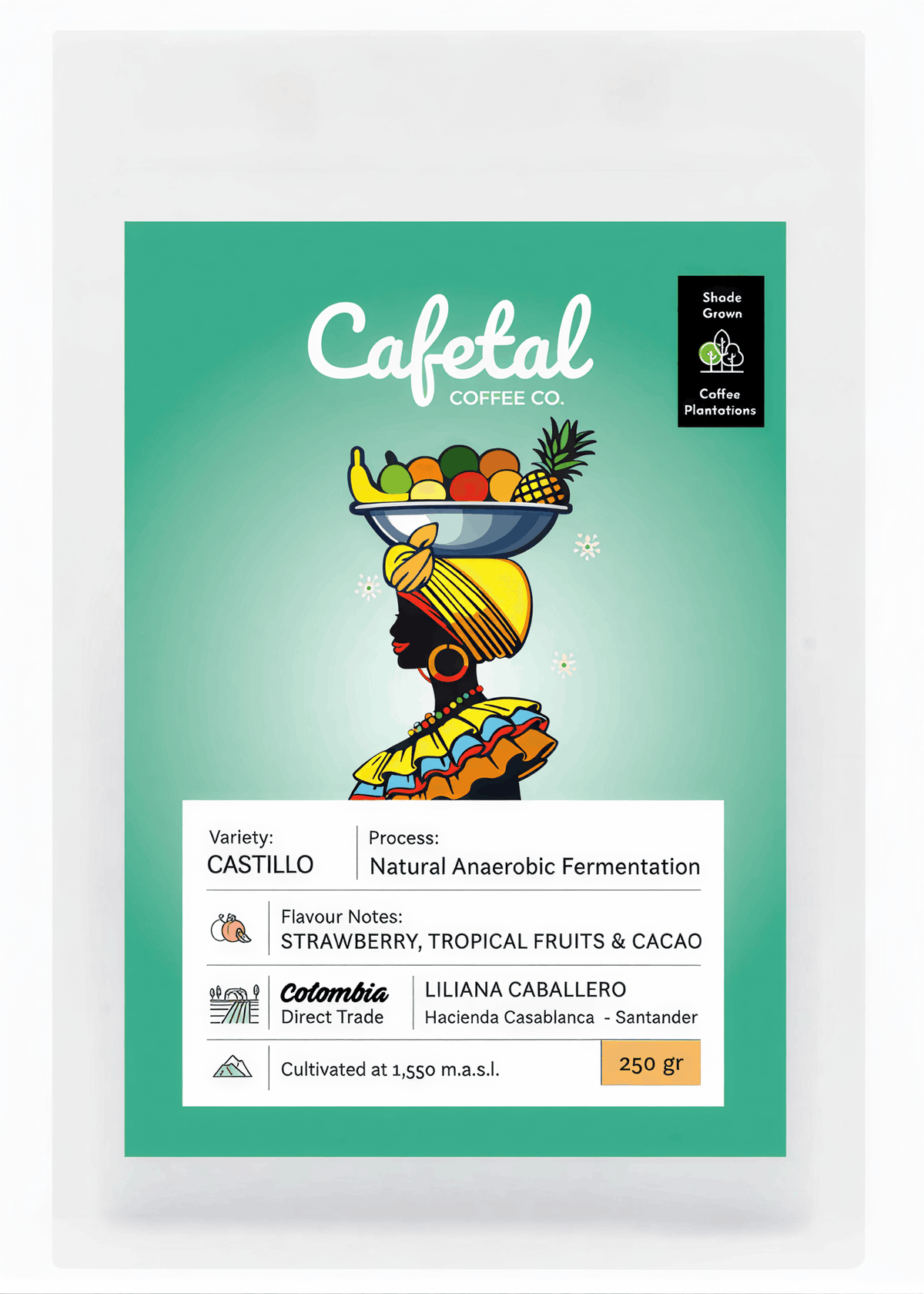 A package of Cafetal Coffee Co. Colombia Castillo single-origin coffee, featuring a teal and white label with an illustration of a Colombian Palenquera woman balancing a fruit bowl.