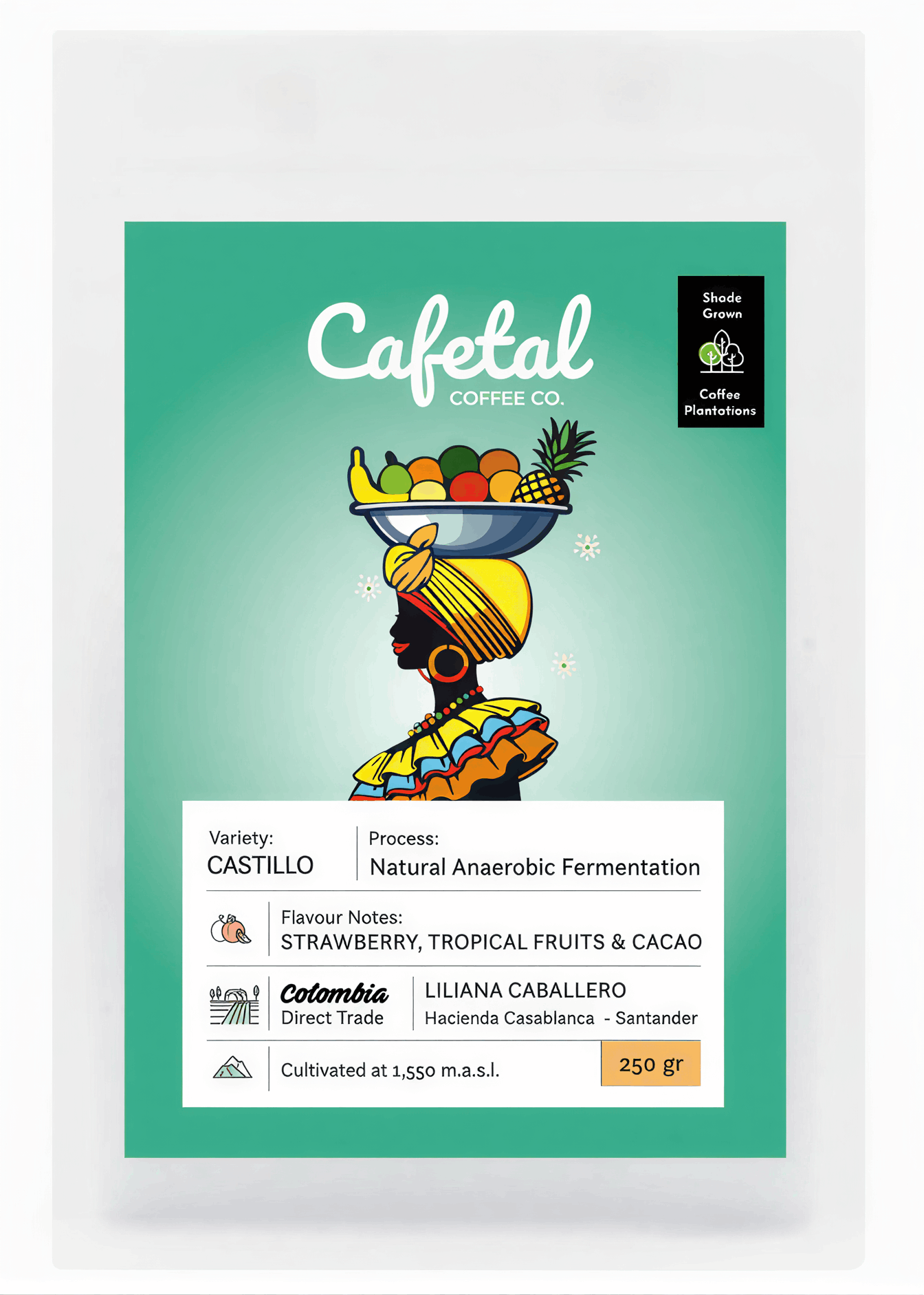 A package of Cafetal Coffee Co. Colombia Castillo single-origin coffee, featuring a teal and white label with an illustration of a Colombian Palenquera woman balancing a fruit bowl.